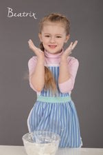 Kids lace apron worn while baking