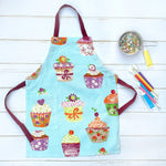 Blue and pink cupcake print kids chef apron, front view