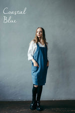 Short linen crossover pinafore apron in coastal blue