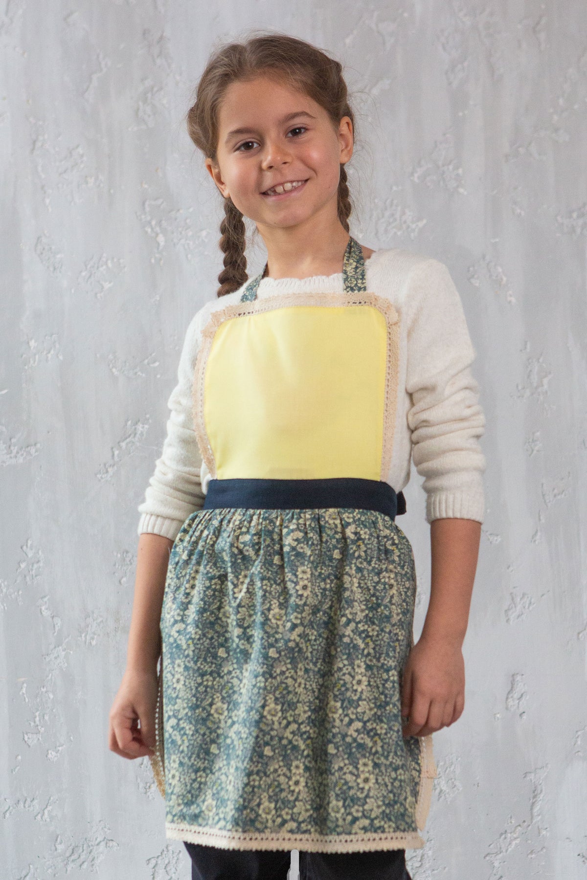 Tilly design kids apron worn by a girl