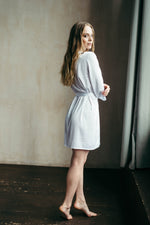 White bridal satin robe worn for getting ready