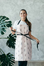 Bunny print kids apron in cotton canvas, front view