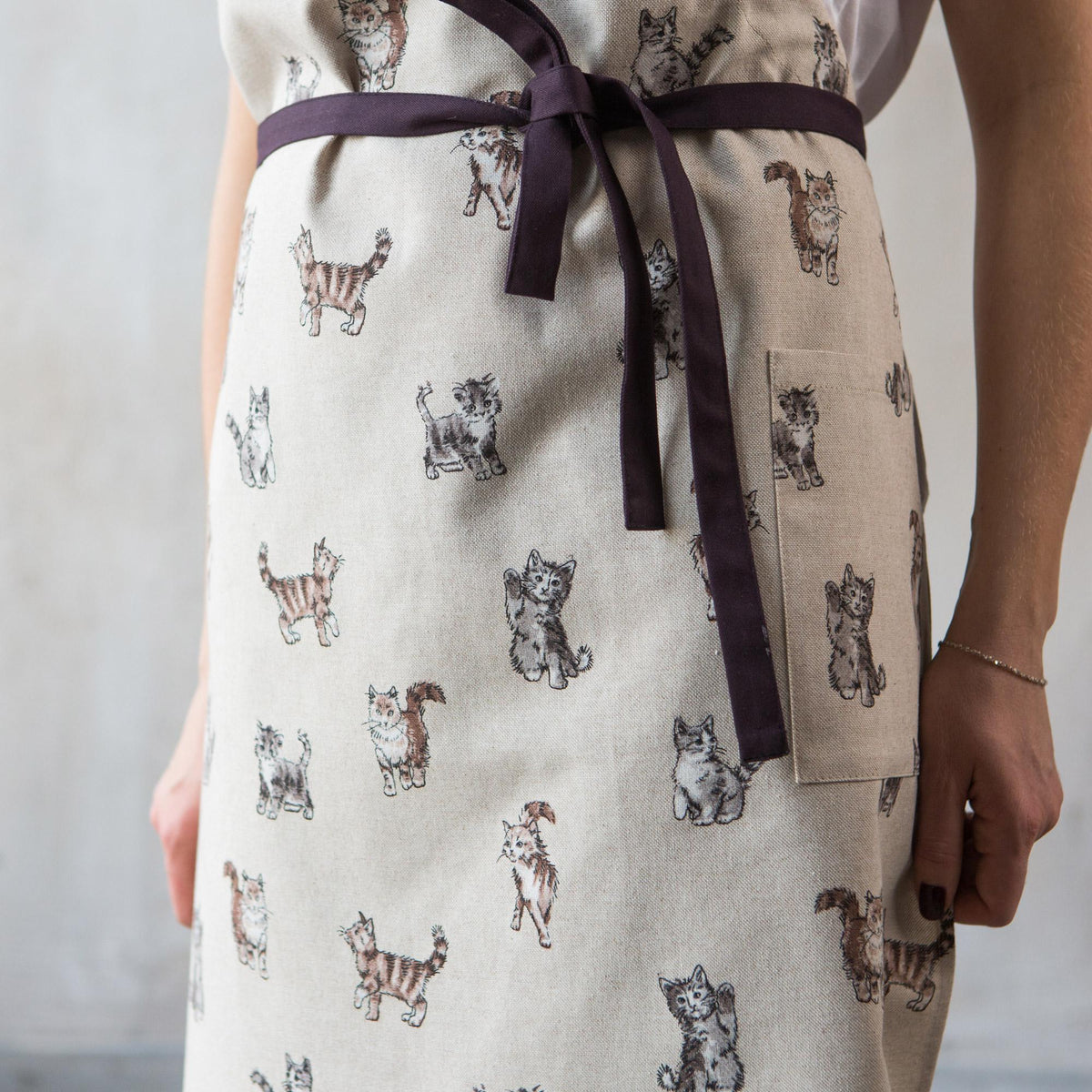 Cat print apron styled, full length view