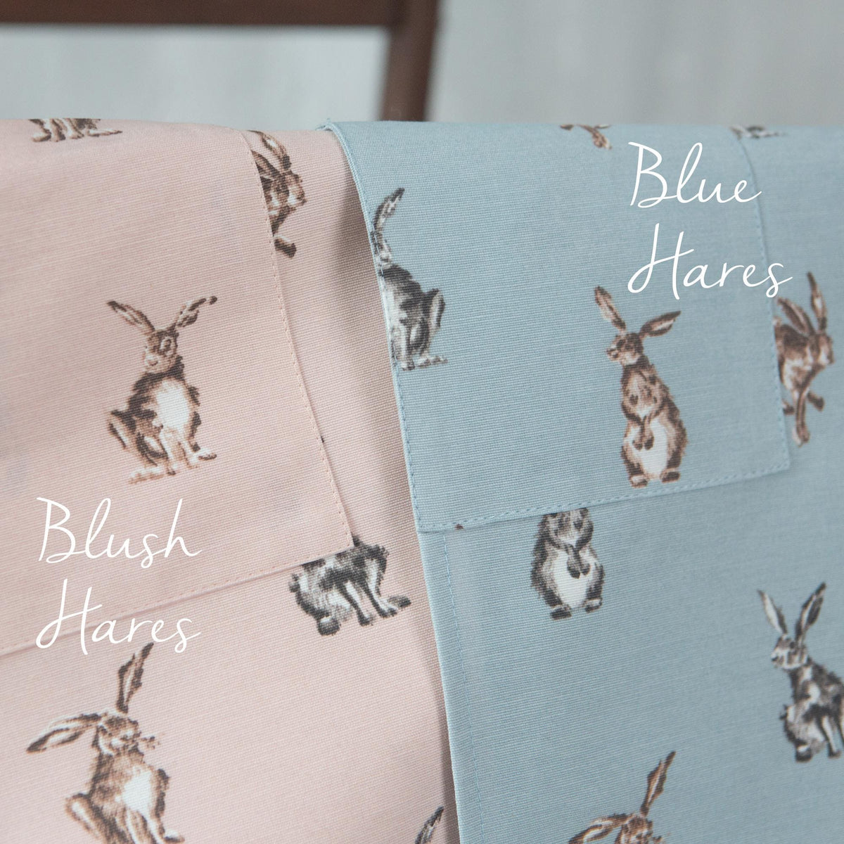 Cat print aprons worn by parent and child in the kitchen