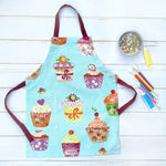 Blue and pink cupcake print cotton apron, front view