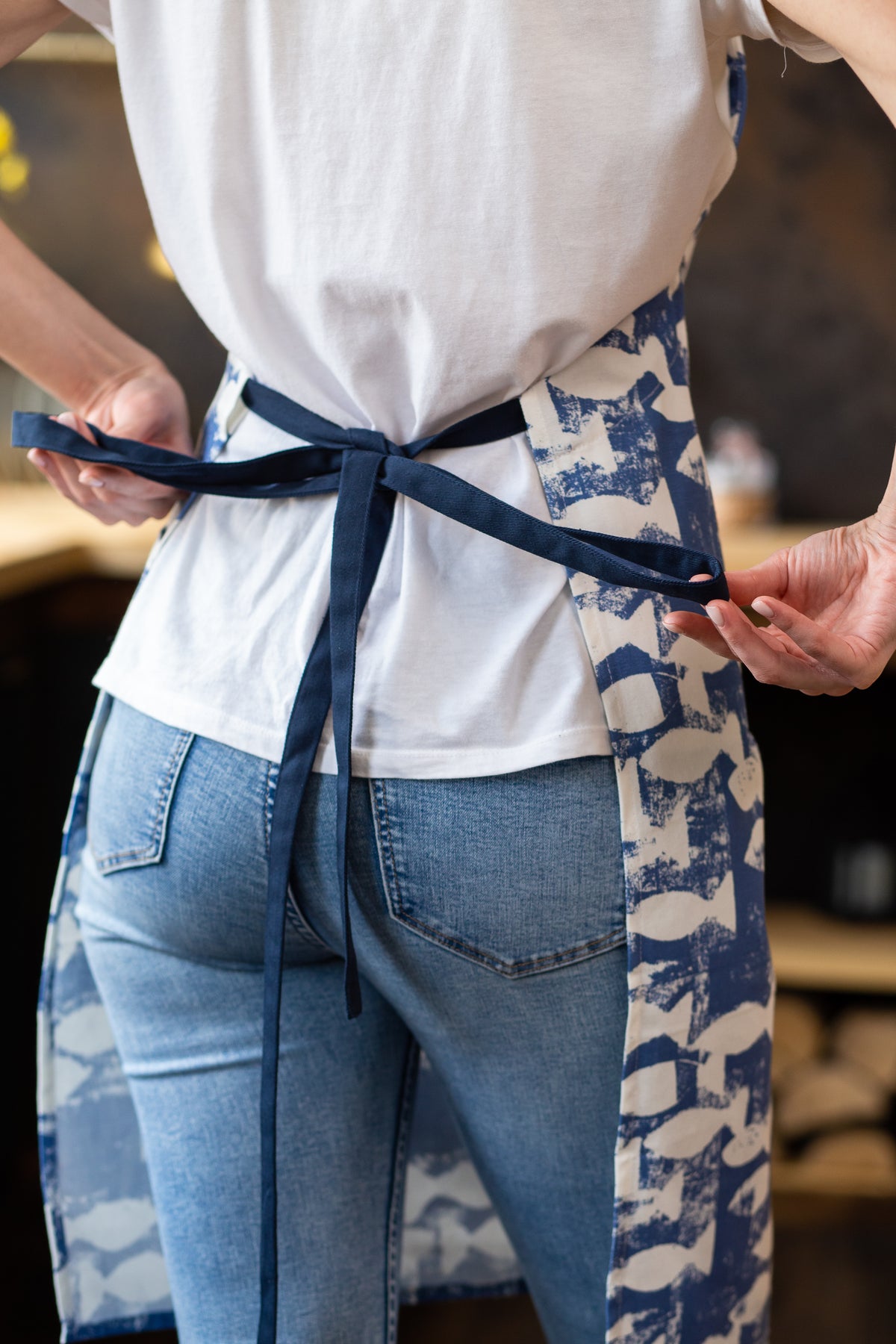 Cotton apron for women in a printed design, styled