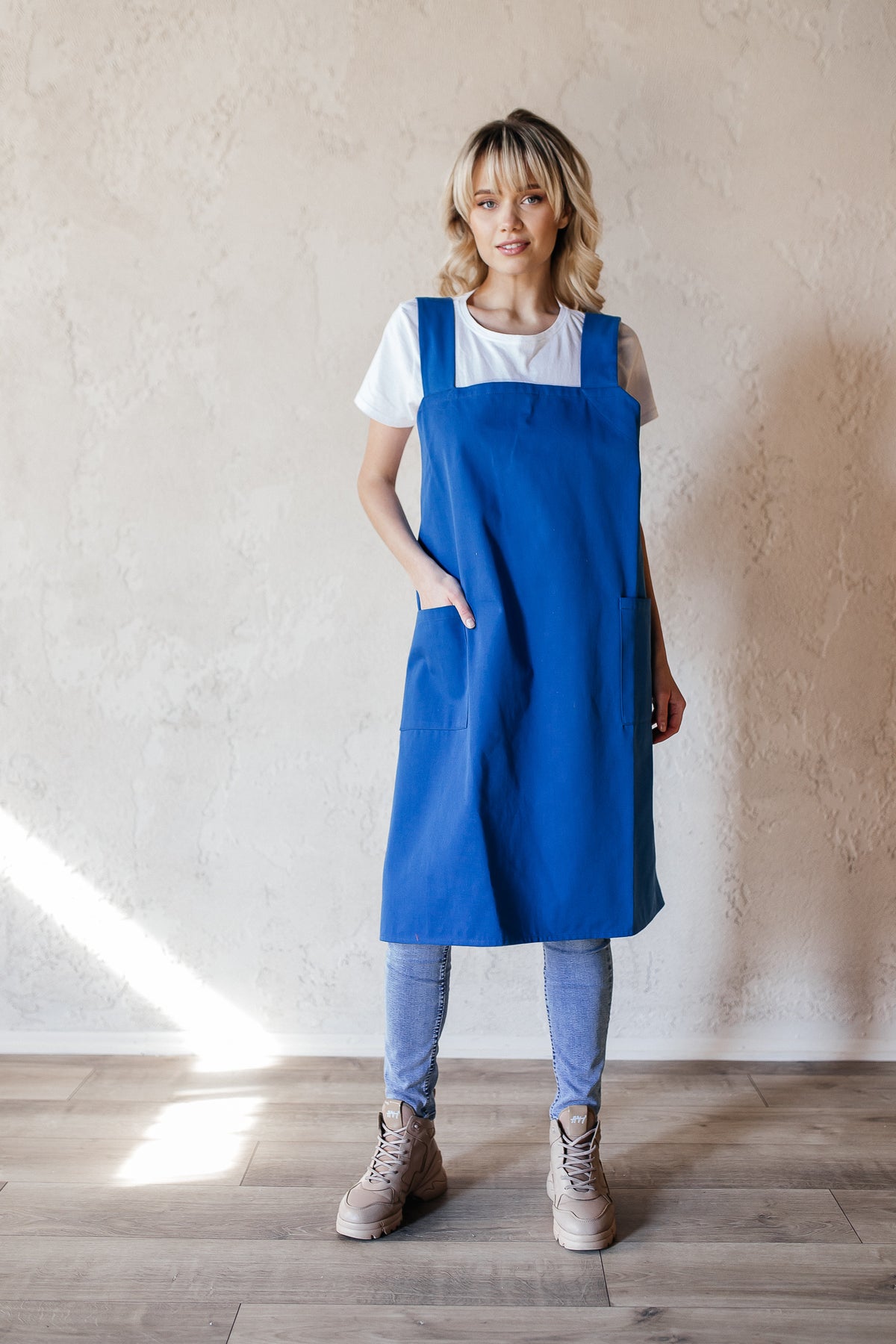 Cotton canvas pinafore apron in cornflower blue