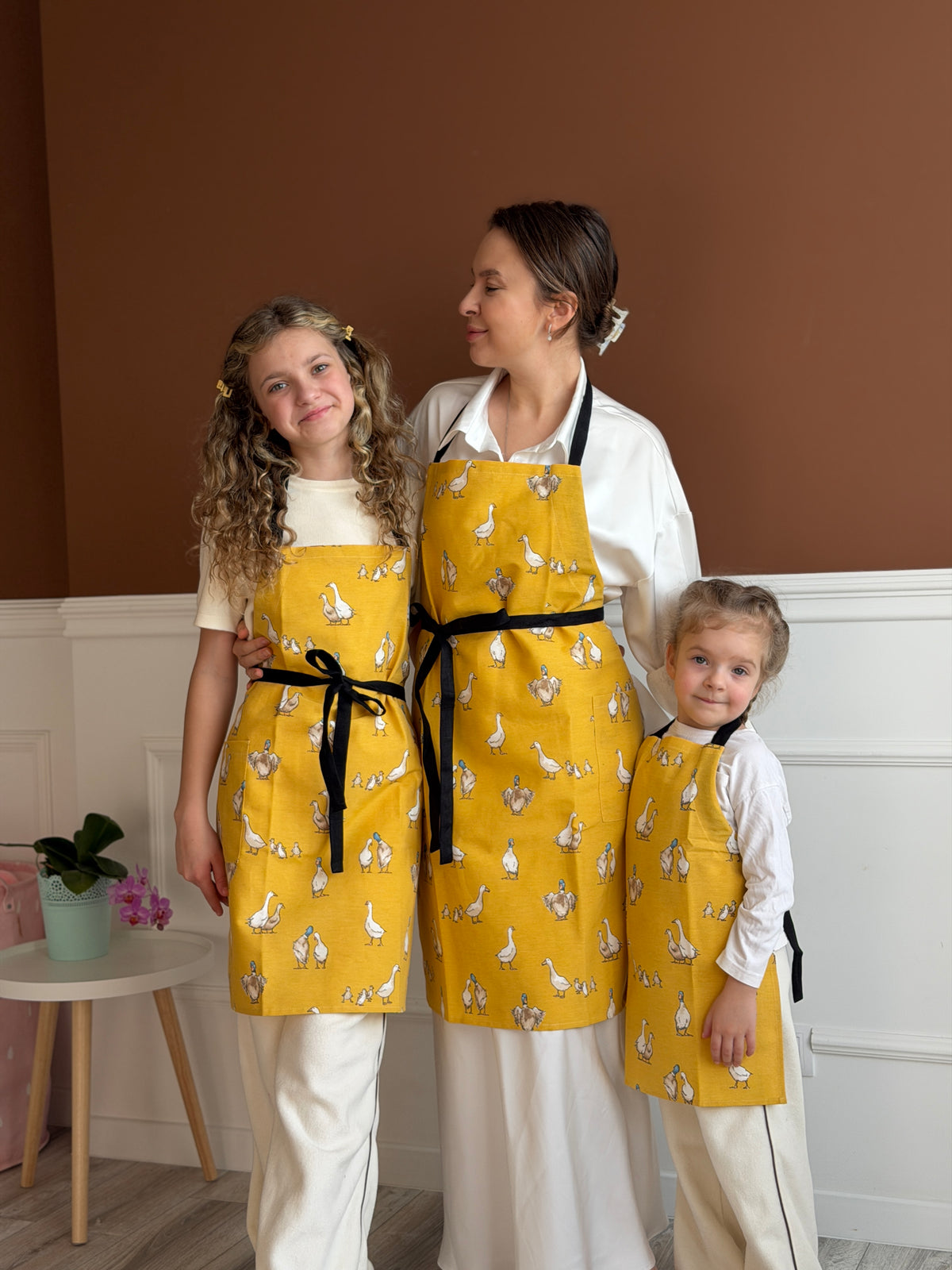 Duck print kids apron worn while baking