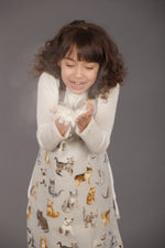 Dog print kids apron in grey, back view showing ties