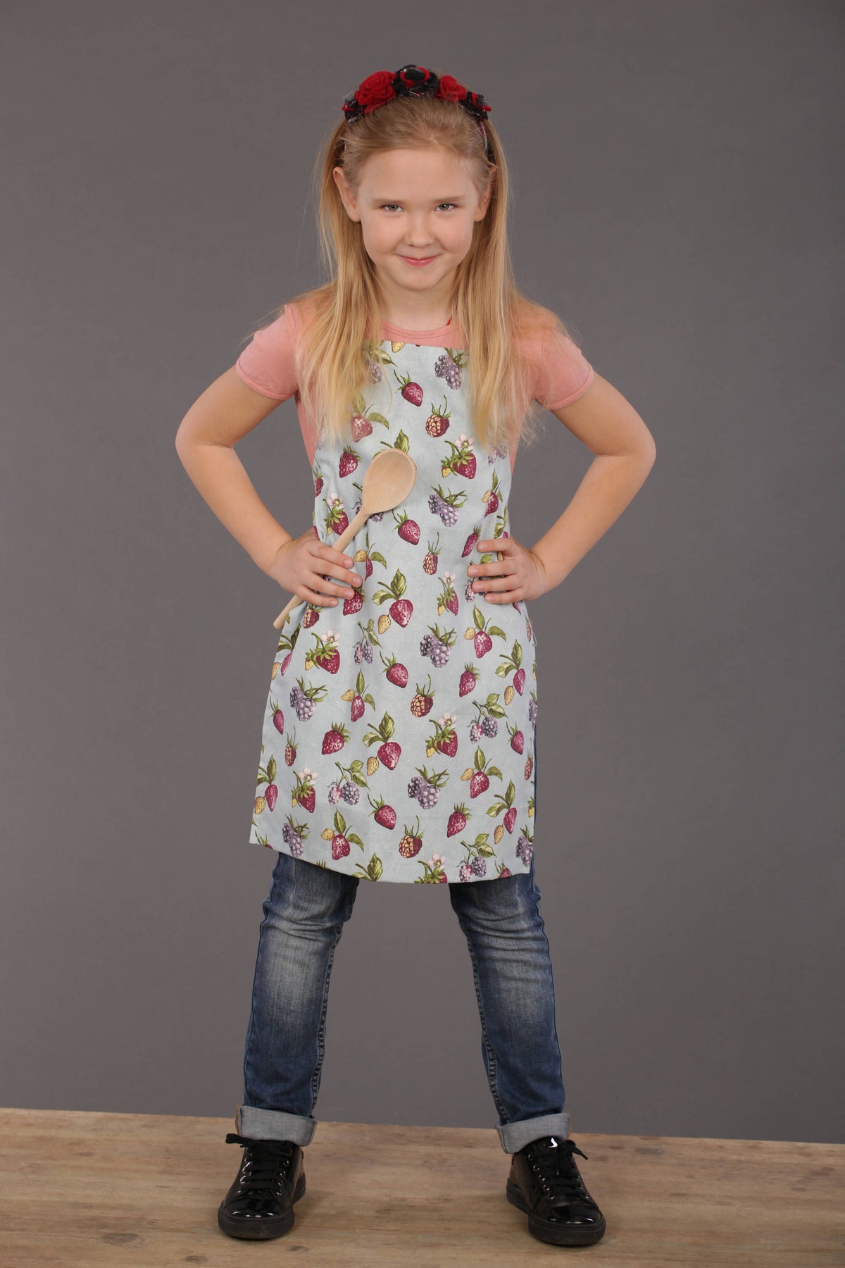 Beige strawberry print apron, full front view
