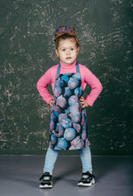 Childrens apron in cotton canvas, styled while baking