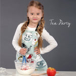 Yellow tropical print kids chef apron, styled