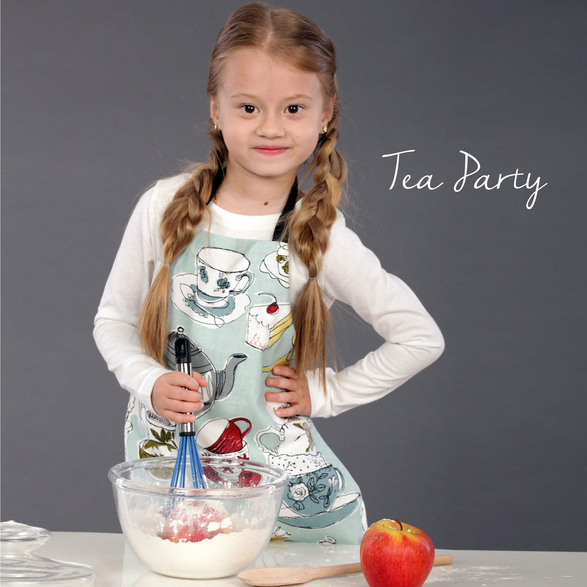 Yellow tropical print kids chef apron, styled