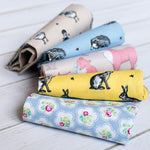 Kids pinafore apron print options shown together