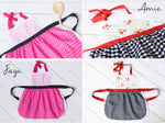Mother and daughter matching lace aprons