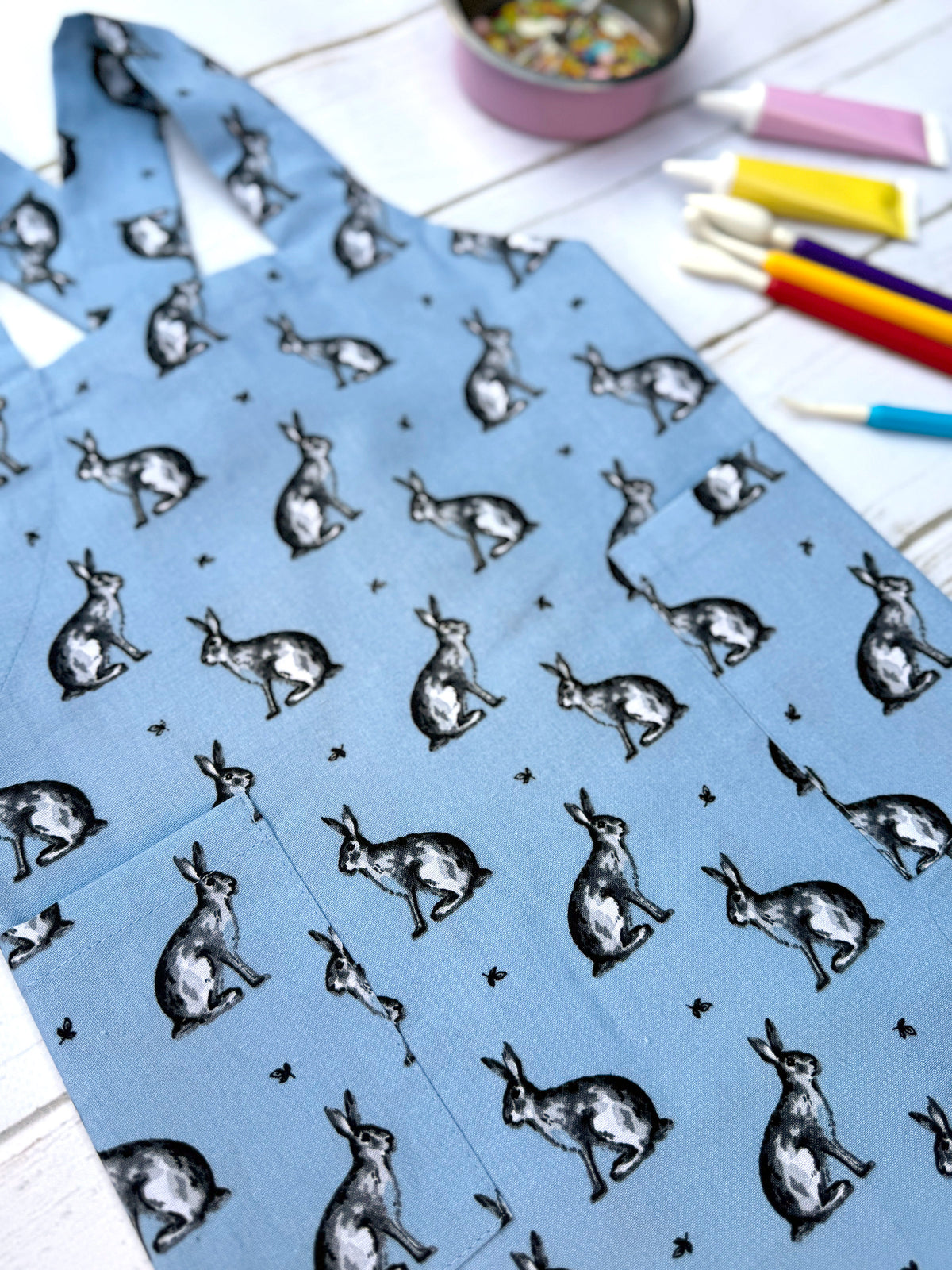 Blue hare pinafore apron for toddlers and boys