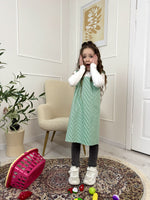 Kids cross back smock apron in green stripe, worn