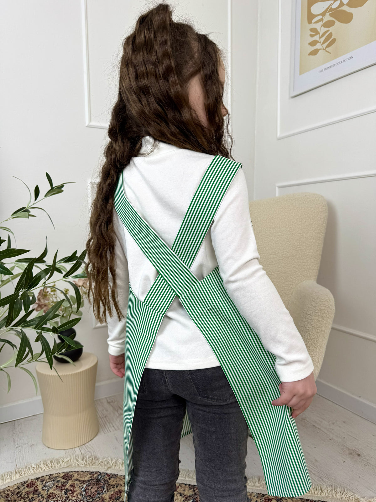 Green striped smock apron, pocket detail