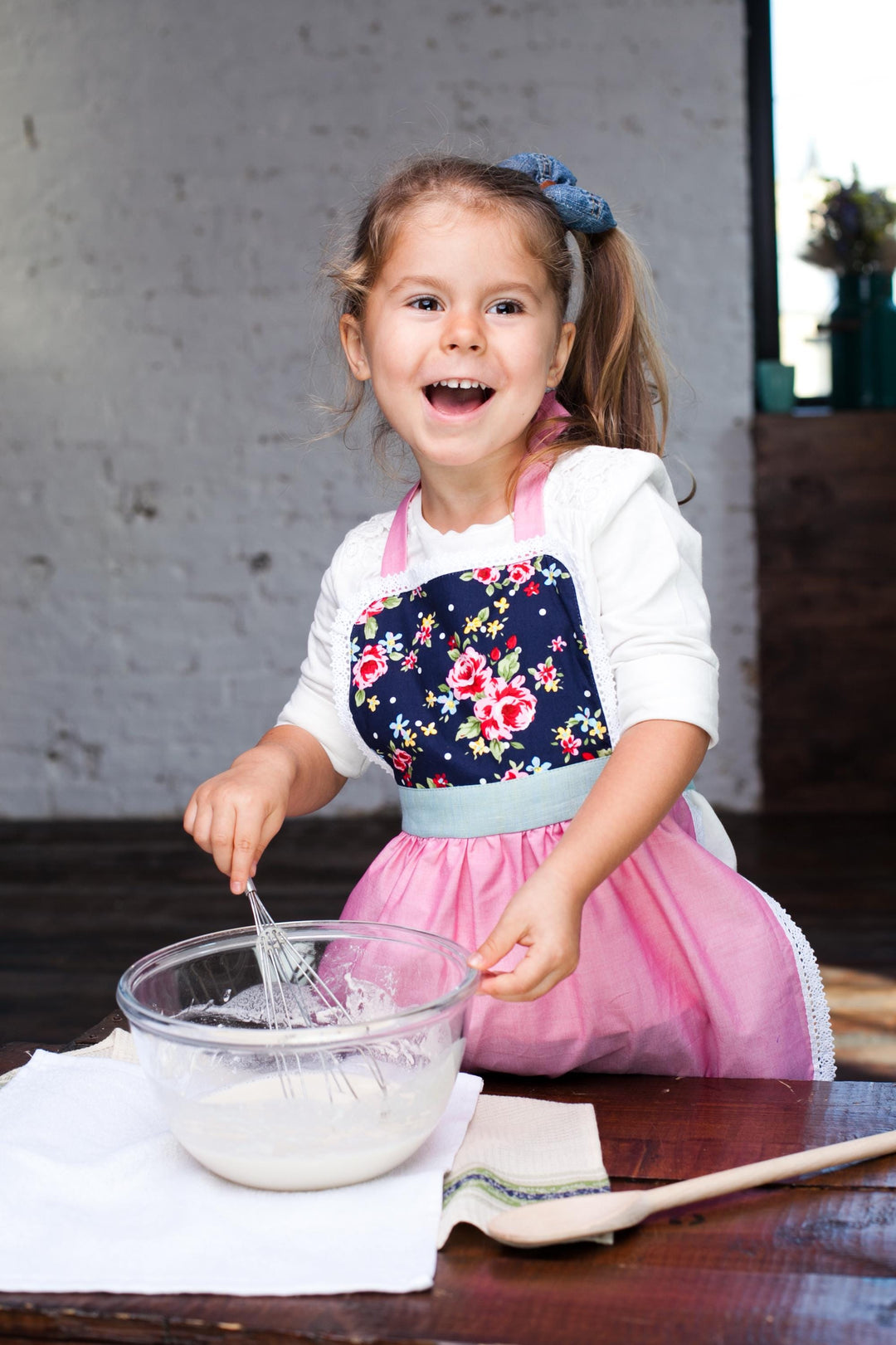 Red lace apron for girls, front view