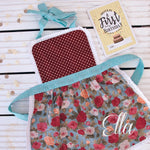 Lace apron in red, lace edging detail