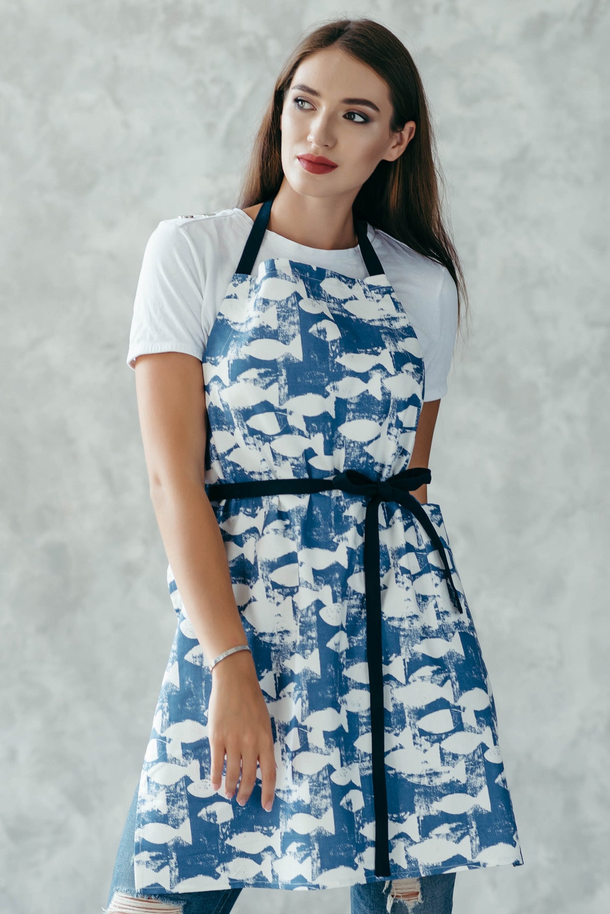Nautical kitchen apron in blue polka dot cotton, front view