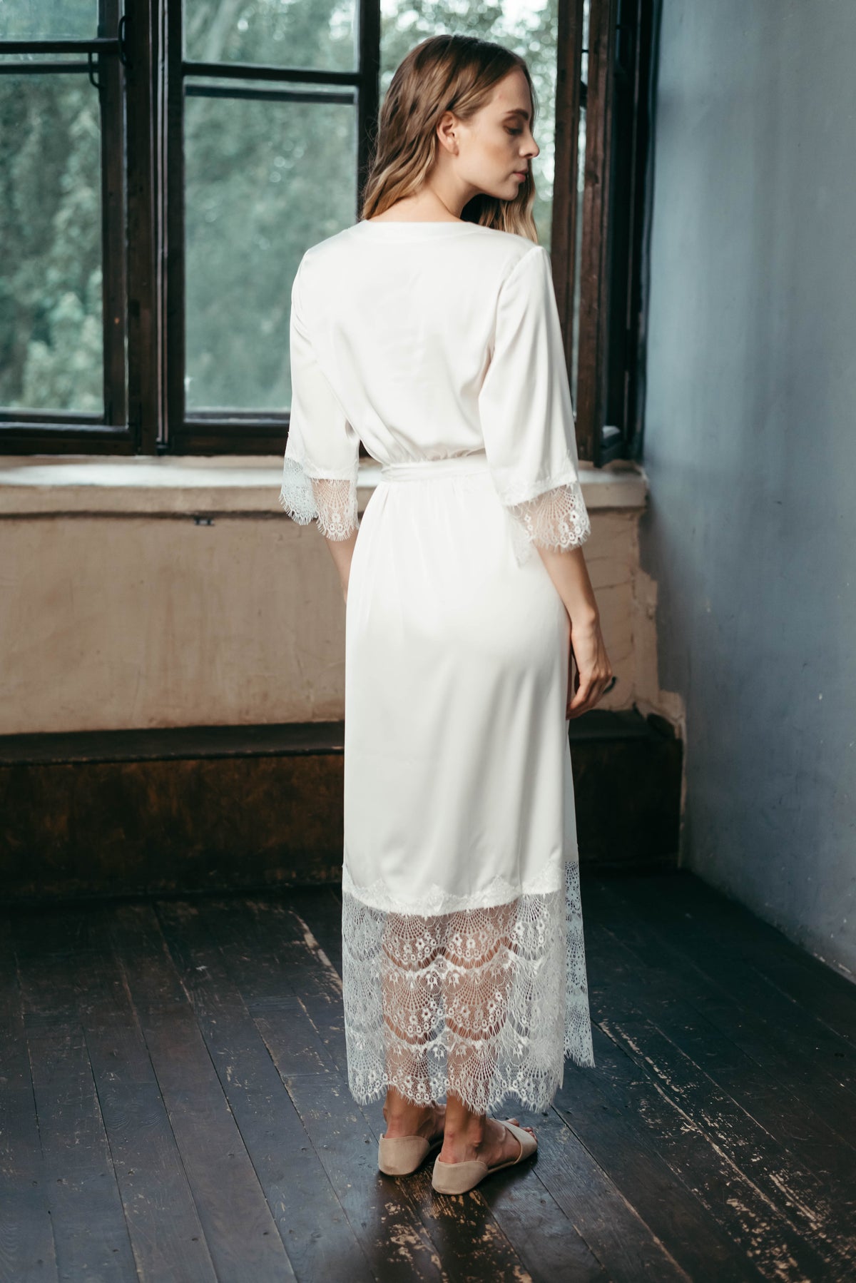 Chantilly lace trim on the cuff of the ivory satin robe