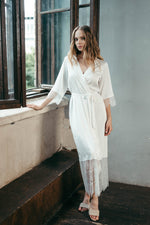 Ivory satin bridal robe, back view showing the hem