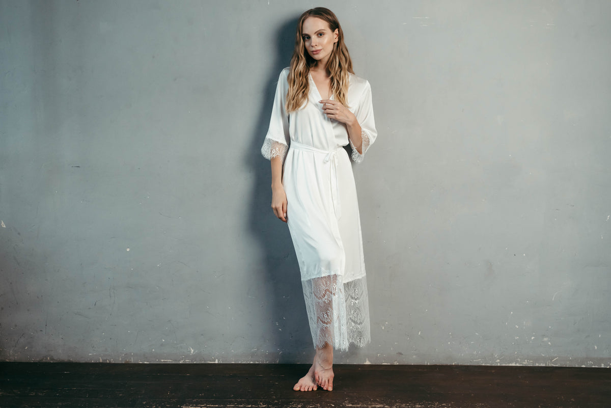 Ivory satin bridal robe styled for the wedding morning