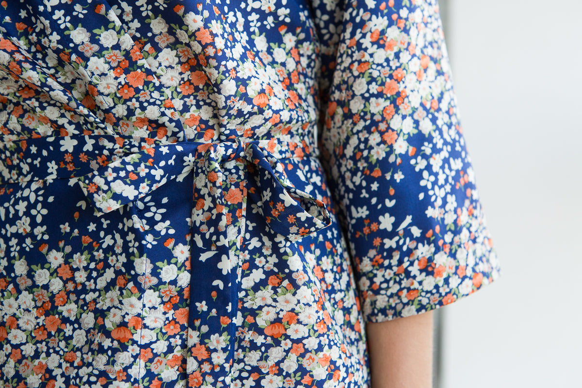 Short floral kimono robe worn open over nightwear