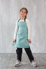 Toddler apron pocket detail, cotton canvas