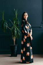 Black floral kimono, full length front view with obi belt tied