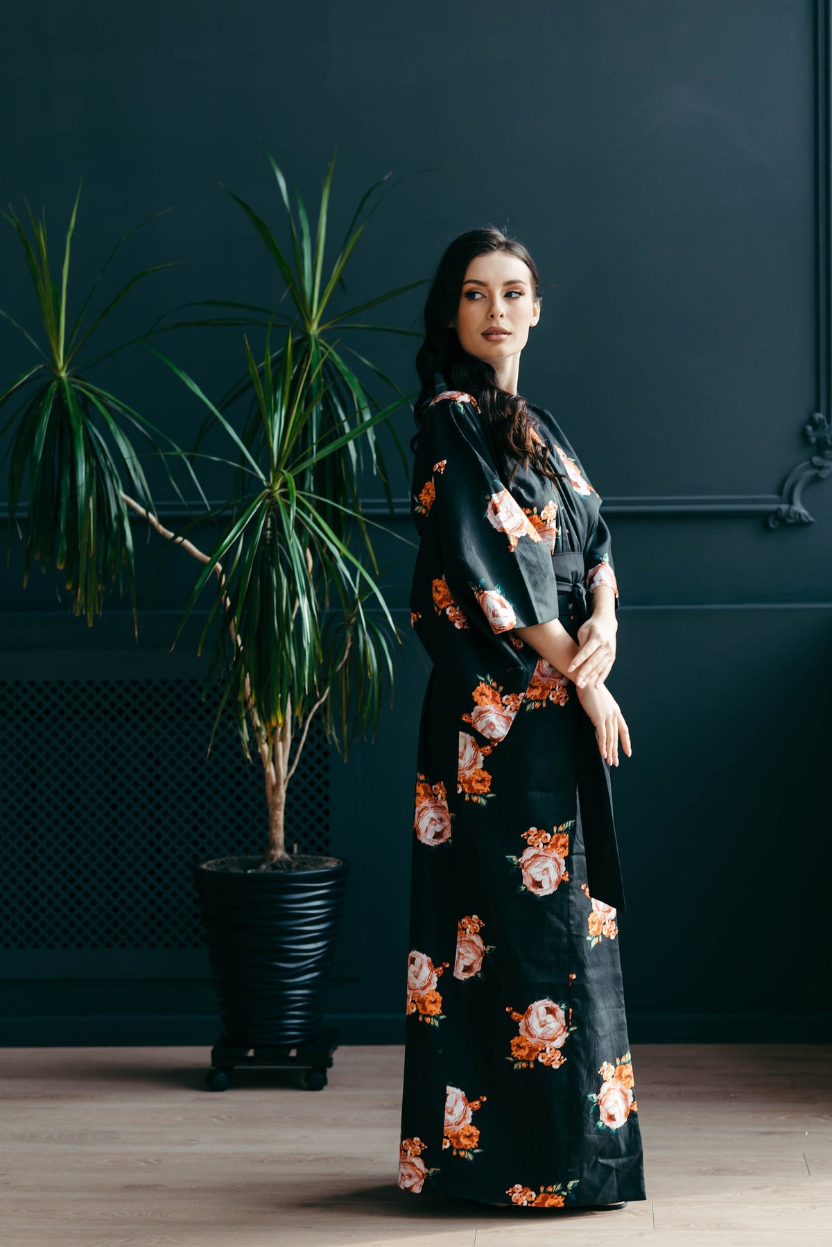 Black floral kimono, full length front view with obi belt tied