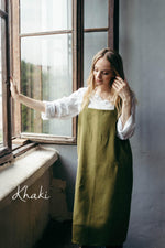 Linen apron styled, painting over clothes shown