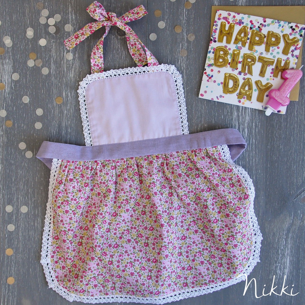 Kids lace apron worn by a toddler