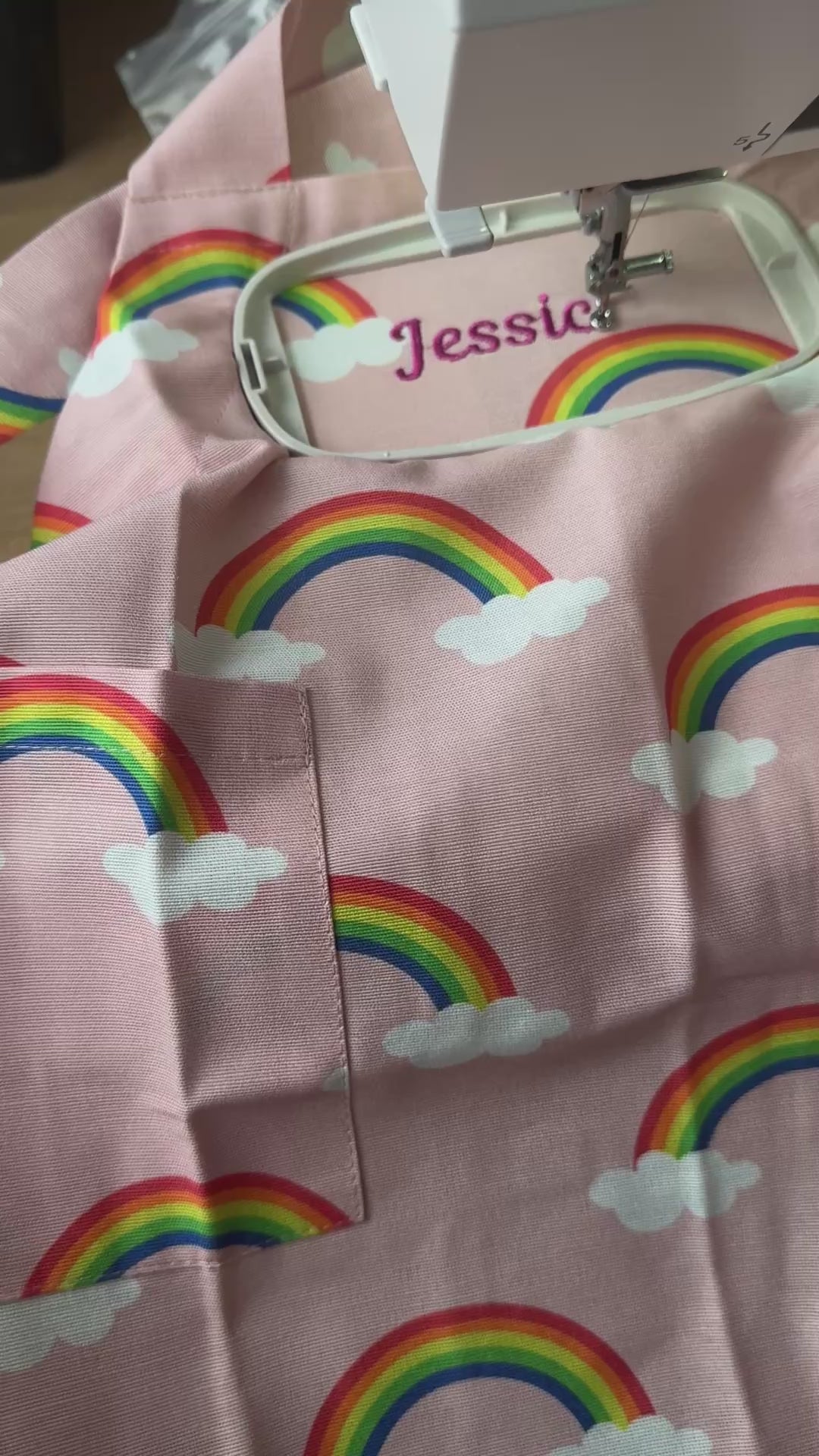 Personalised kids pink cotton apron with rainbow print