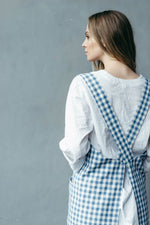 Checked cross back apron, strap detail